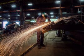In this file photo Fabricator Mike Caldarino uses a grinder on a steel stairs being manufactured for a high school in Redmond, Wash., at George Third & Son Steel Fabricators and Erectors, in Burnaby, B.C., on Thursday March 29, 2018. Statistics Canada says manufacturing sales fell 2.1 per cent to $69.6 billion in June, as sales for the transportation equipment, chemical product and primary metal subsectors moved lower. THE CANADIAN PRESS/Darryl DyckIn this file photo Fabricator Mike Caldarino uses a grinder on a steel stairs being manufactured for a high school in Redmond, Wash., at George Third & Son Steel Fabricators and Erectors, in Burnaby, B.C., on Thursday March 29, 2018. Statistics Canada says manufacturing sales fell 2.1 per cent to $69.6 billion in June, as sales for the transportation equipment, chemical product and primary metal subsectors moved lower.